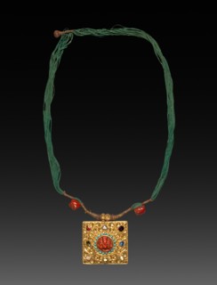 Charm Case, 1800s. Tibet, 19th century. Gold with jewels; overall: 7.2 x 7.8 cm (2 13/16 x 3 1/16