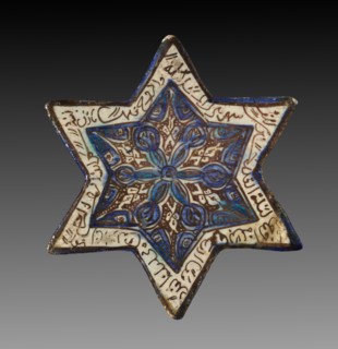 Wall Tile, 1300s. Iran, Kashan, 14th century. Fritware with luster-painted design; diameter: 18.5