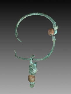 Earring, 30 BC-AD 395. Egypt, Roman Empire. Bronze and glass; diameter: 2.5 cm (1 in.).