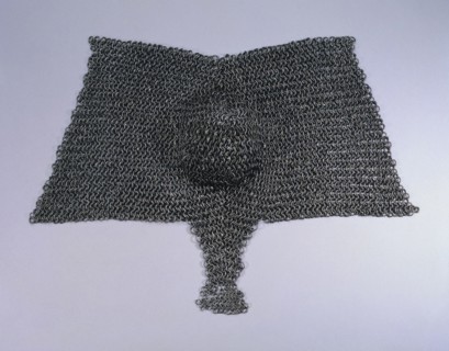 Brayette, 1400s. European, 15th century. Riveted steel rings; strongly reinforced; diameter: 1 cm