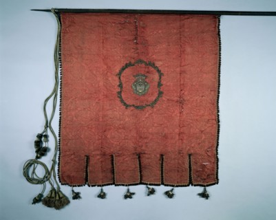 Banner, 1700s. Spain, 18th century. Crimson silk brocade, with applied embroidery; scalloped border
