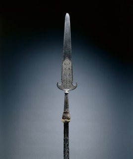 Partisan, c. 1600-1650. France, 17th century. Steel, etched; octagonal wood haft with studs and