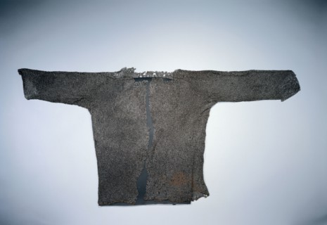 Hauberk, 1400s. Europe, 15th century. Very fine rings; border of brass rings at bottom edge;