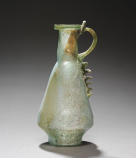 Jug, 100-300. Cyprus, 2nd-3rd Century. Glass; overall: 13.4 cm (5 1/4 in.).