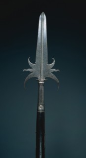 Partisan, c. 1650. France, 17th century. Steel; round wood haft; blade: 33 cm (13 in.); haft: 100.5