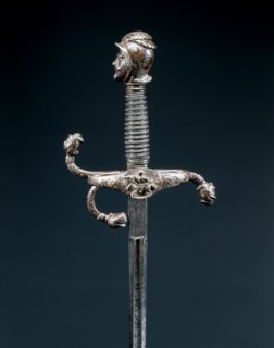 Rapier, c. 1600. Germany, Solingen, early 17th Century. Russeted and gilded steel with inlaid