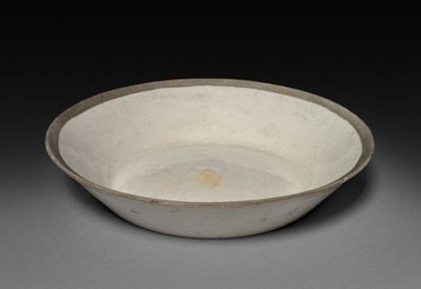 Saucer: Ding ware, 12th-13th Century. China, Jin dynasty (1115-1234) - Yuan dynasty (1271-1368).