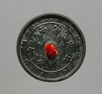 Mirror, 794-1185. Japan, Heian Period (794-1185). Bronze; diameter: 12.2 cm (4 13/16 in.).