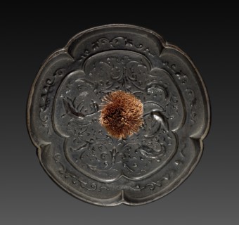 Mirror, 794-1185. Japan, Heian Period (794-1185). Bronze; diameter: 12.2 cm (4 13/16 in.).