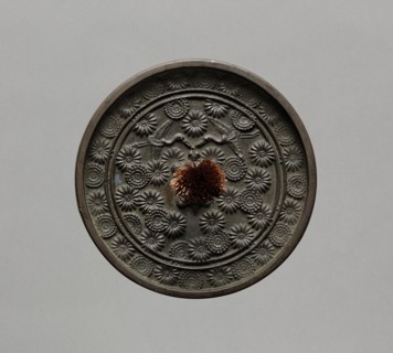 Mirror, 1400s-1500s. Japan, Muromachi Period (1392-1573). Bronze; diameter: 11.8 cm (4 5/8 in.).