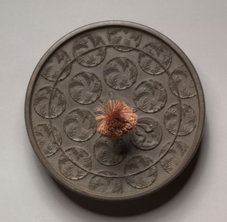 Mirror, 794-1185. Japan, Heian Period (794-1185). Bronze; diameter: 17.8 cm (7 in.).