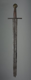 Sword, c. 1350. Germany (?), 14th century. Iron; wood grip and brass pommel replacements; overall: