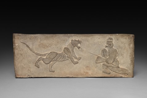 Panel from Model Cooking Stove: Lancer Jousting with a Tiger, 1st Century BC. China, from a tomb in