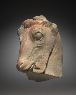 Fragment of a Goat's Head, c. 500 BC. Greece, Attic, late 6th Century BC. Limestone; overall: 35 cm