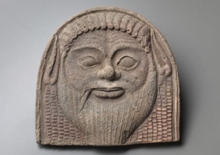 Antefix with Satyr Face, 450-400 BC. Italy, Tarentum, 2nd half 5th Century BC. Terracotta; overall: