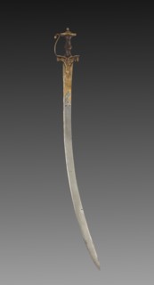 Tulwar Sword, 1700s. India, probably Deccan, 18th century. Iron hilt with gold; steel blade with