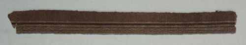 Two Galloon Fragments Mounted Together, late 1000s. Italy, Sicily, end of 11th century. Tablet