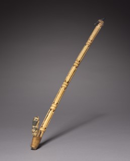 Spear Thrower, 200 BC-200. Peru, South Coast, late Paracas or early Nasca style. Bone, hematite,