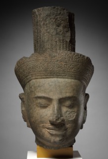Head of Shiva, 1100s. Cambodia, Angkor, 12th century. Sandstone; with base: 42 cm (16 9/16 in.)