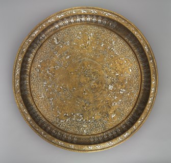 Tray Portraying Courtly Pleasures, 1240s. Syria, Ayyubid Period, 13th century. Sheet brass inlaid
