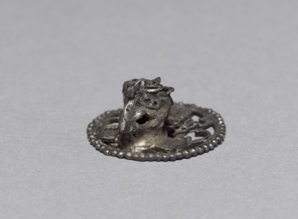 Eagle Ornament, c. 1200-1519. Mexican, Oaxaca, Mixtec style. Silver; diameter: 2.2 cm (7/8 in.);