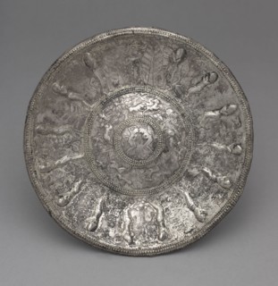 Dish with Tambourine Players, 700-600 BC. Phoenicia, 7th Century BC. Silver, partially gilt;