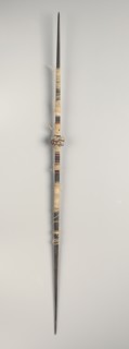 Spindle, c. 1st-3rd century. Peru, South Coast, Nasca style, early period. Wood with carved clay