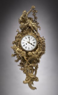 Wall Clock, c. 1750-1760. France, 18th century. Gilt bronze; overall: 116.9 x 50.8 x 27.7 cm (46 x