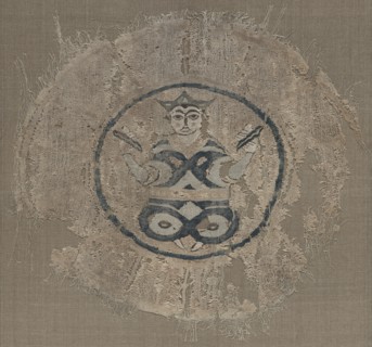 Roundel with seated prince, 1000s. Egypt, Fatimid period. Plain weave with inwoven tapestry weave:
