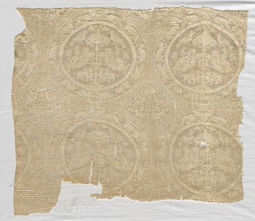 Silk fragment with confronted animal medallions and kufic bands, 1480-1649. Iran. Diasper, tabby