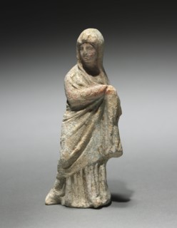 Figurine, 300-100 BC. South Italy, Tarentum, 3rd - 2nd Century BC. Terracotta; overall: 11.5 cm (4