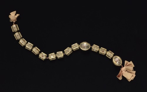 Beads from a Rosary, early 1500s. Italy, early 16th century. Gilt copper with champlevé enamel ;