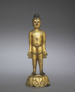 The New-born Buddha, 400s. China, Northern Wei dynasty (386-534). Gilt bronze with inlays of blue
