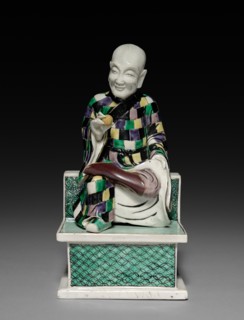 Lohan Holding a Peach, 1662-1722. China, Jiangxi province, Jingdezhen kilns, Qing dynasty