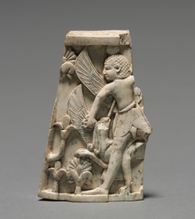 Decorative Plaque: Man; and Griffin in Combat, 900-800 BC. Phoenician, Iraq, Nimrud, 9th-8th