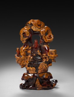 Bodhisattva Guanyin Seated in a Rock Grove, 1675-1700. China, Qing dynasty (1644-1911). Opaque