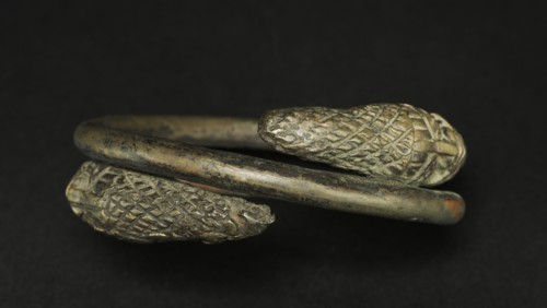 Hand Coil, 1800s. Guinea Coast, Nigeria, Benin, 19th century. Bronze; diameter: 11.5 cm (4 1/2 in.)