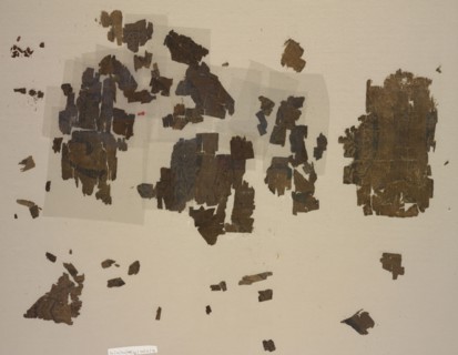 Taqueté fragments with winged lions in roundels, 899-1160. Iran, Buyid or Seljuk period. Taqueté: