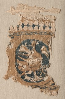 Fragment from a Hanging (?) with Roundel and Border, 800s - 900s. Egypt, late Abbasid - early