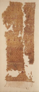 Tiraz with dense guilloche bands, 1100s. Egypt, Fatimid period. Plain weave with inwoven tapestry