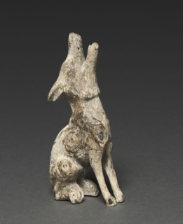 Howling Wolf, c. 500-200 BC. Southern Siberia, 5th-3rd Century BC. Wood with shell inlays; overall:
