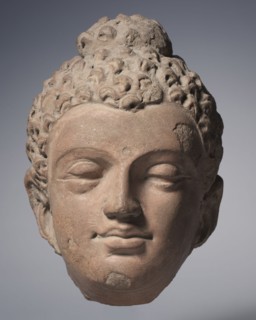 Head of Buddha, 700s. India, Kashmir, Akhnur school, 8th century. Clay, accidentally burned;