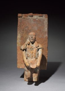 Figurine with Back Rack, 300-900. Mexico, Maya, Jaina style. Molded and modeled pottery with traces