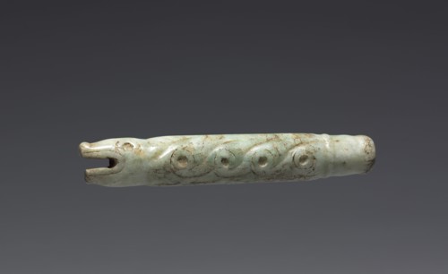 Serpent-form Fan Handle(?), 900-1519. Central Mexico, Mixtec. Pale green jade; diameter: 1.9 cm