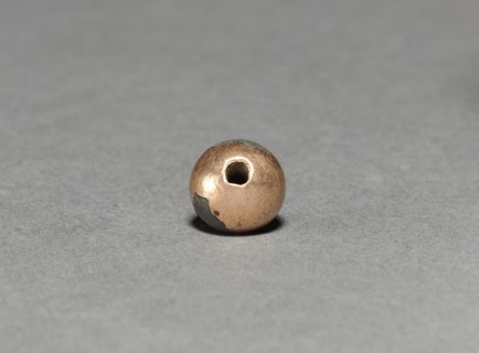 Bead, 1200-1519. Mexico, Oaxaca, Mixtec. Clay covered with gold; diameter: 1 cm (3/8 in.).