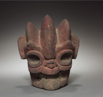 Head Hacha, 300-900. Mexico, Veracruz. Gray volcanic stone with red pigment; overall: 19.5 x 17.2 x