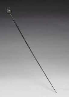 Garment Pin, c. 1400 BC. Possibly Hungary, Bronze Age, c. 2500-800 BC. Cast and wrought bronze;