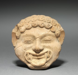 Gorgon Plaque with Incised Figure of a Dancing Satyr, c. 525-475 BC. Greece, South Italy, Taranto,