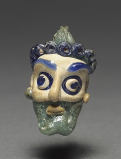 Head Pendant, 600-500 BC. Lebanon, Syro-Phoenicia, 6th - 5th centuries B.C.. Glass; overall: 3.5 x