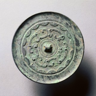 Mirror with Continuous Arcs and Quasi- Dragons, late 3rd century BC-1st century. China, Western Han